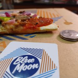 Blue Moon Pizza - Crust as thin as two quarters.   Undercooked, had to reheat and turned to cracker crust. Definitely not what they advertise.