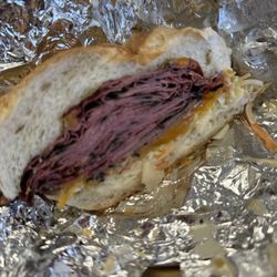 S & J Deli Superette - Pastrami, cheddar, and cold slaw.