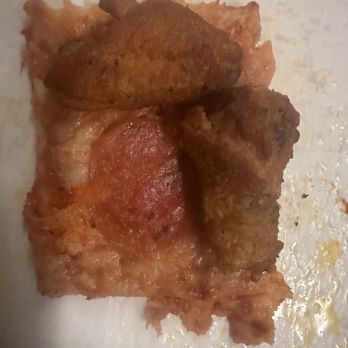 Tasta Pizza - That's a photo of two tiny chicken wings. Hardly bigger than a slice of pepperoni. Those two tiny wings cost $2.60. - Pizza Near Me - Olean, New York