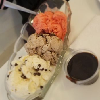 Crown Candy Kitchen - Strawberry, chocolate chip, and chocolate chocolate chip, hot fudge on the side. - Candy Stores Near Me - St. Louis, Missouri