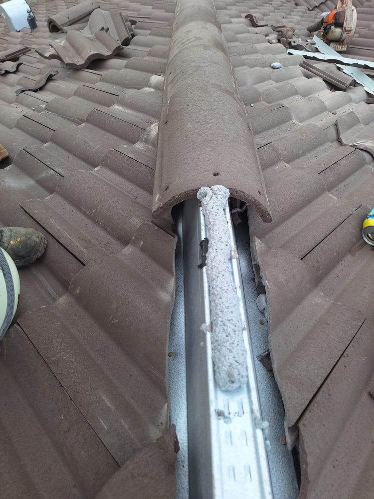 Slide of Ronald Rossi Roofing