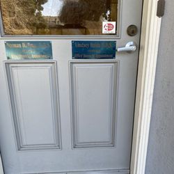 Lindsey Koida DDS & Norman Burg DDS - Dentist information plaques