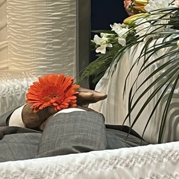 Santos Robinson Mortuary - Loved one's hand sticking up 5 inches in a salute position. Disrespectful and unacceptable presentation of the deceased. - Mortuary Services Near Me - San Leandro, California Santos Robinson Mortuary - Loved one's hand sticking up 5 inches in a salute position. Disrespectful and unacceptable presentation of the deceased. - Mortuary Services Near Me - San Leandro, California