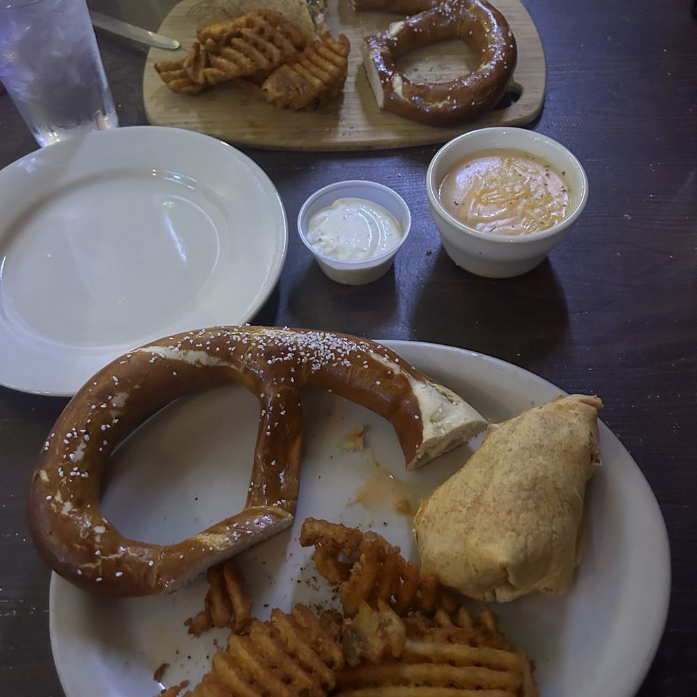 Memphis fries, buffalo chicken wrap, and pretzel with beer cheese