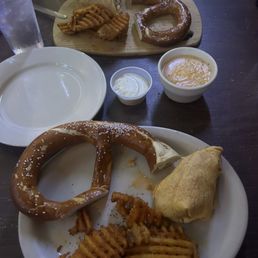 Memphis fries, buffalo chicken wrap, and pretzel with beer cheese Memphis fries, buffalo chicken wrap, and pretzel with beer cheese
