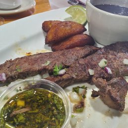 Carne asada with plantains and black beans Carne asada with plantains and black beans