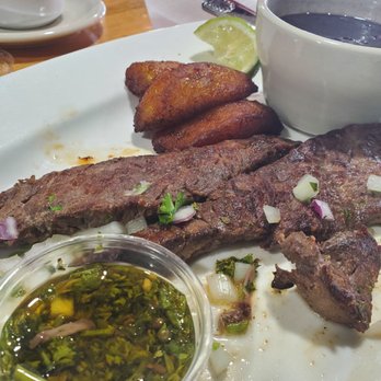 Superlatinos cafe Restaurant - Carne asada with plantains and black beans - Cuban Near Me - Miami, Florida Superlatinos cafe Restaurant - Carne asada with plantains and black beans - Cuban Near Me - Miami, Florida
