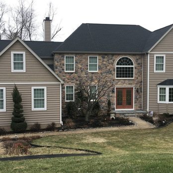 Connolly Contractors - the front of a home in a residential neighborhood - General Contractors Near Me Connolly Contractors - the front of a home in a residential neighborhood - General Contractors Near Me