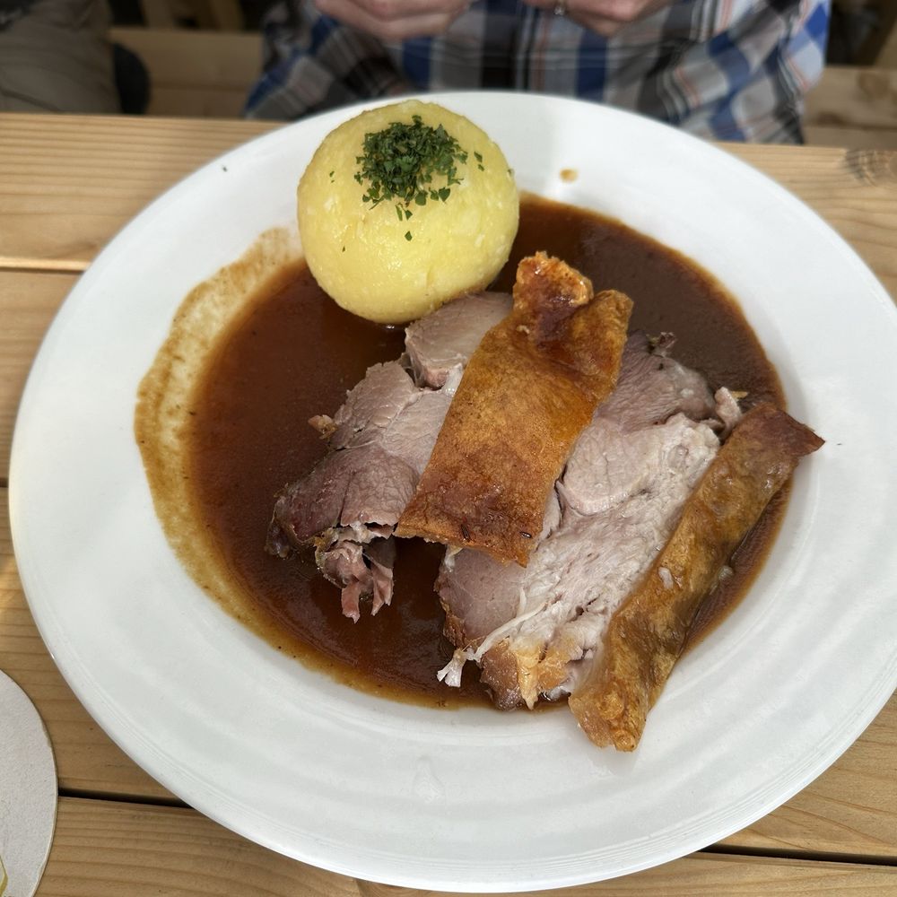 Ayinger Bräustüberl - 1/2 Gilled Pork Shank with dark beer sauce and potato- or bread dumpling. - Beer Garden Near Me - Aying, BY Ayinger Bräustüberl - 1/2 Gilled Pork Shank with dark beer sauce and potato- or bread dumpling. - Beer Garden Near Me - Aying, BY