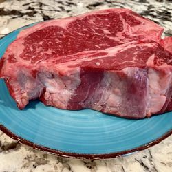 2.5" thick porterhouse steak (cowboy cut)