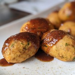 The Red Dot Vegetarian Kitchen - Akara.... They're more like fritters than dumplings. The sauce was sweet and tangy.