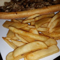 Cavanaugh's Grille - Cheese steak with fries Could have filled out the bun more, but tasted like real steak instead of reconstituted