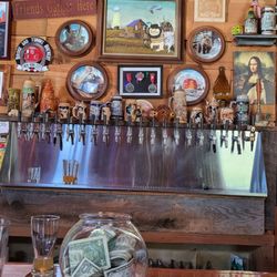 Bridge and Tunnel Brewery - The taps and cool wooden glass overhang throughout the taproom