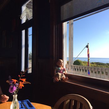 Old Abalone Pub - a child looking out a window - Pubs Near Me - Westport, California