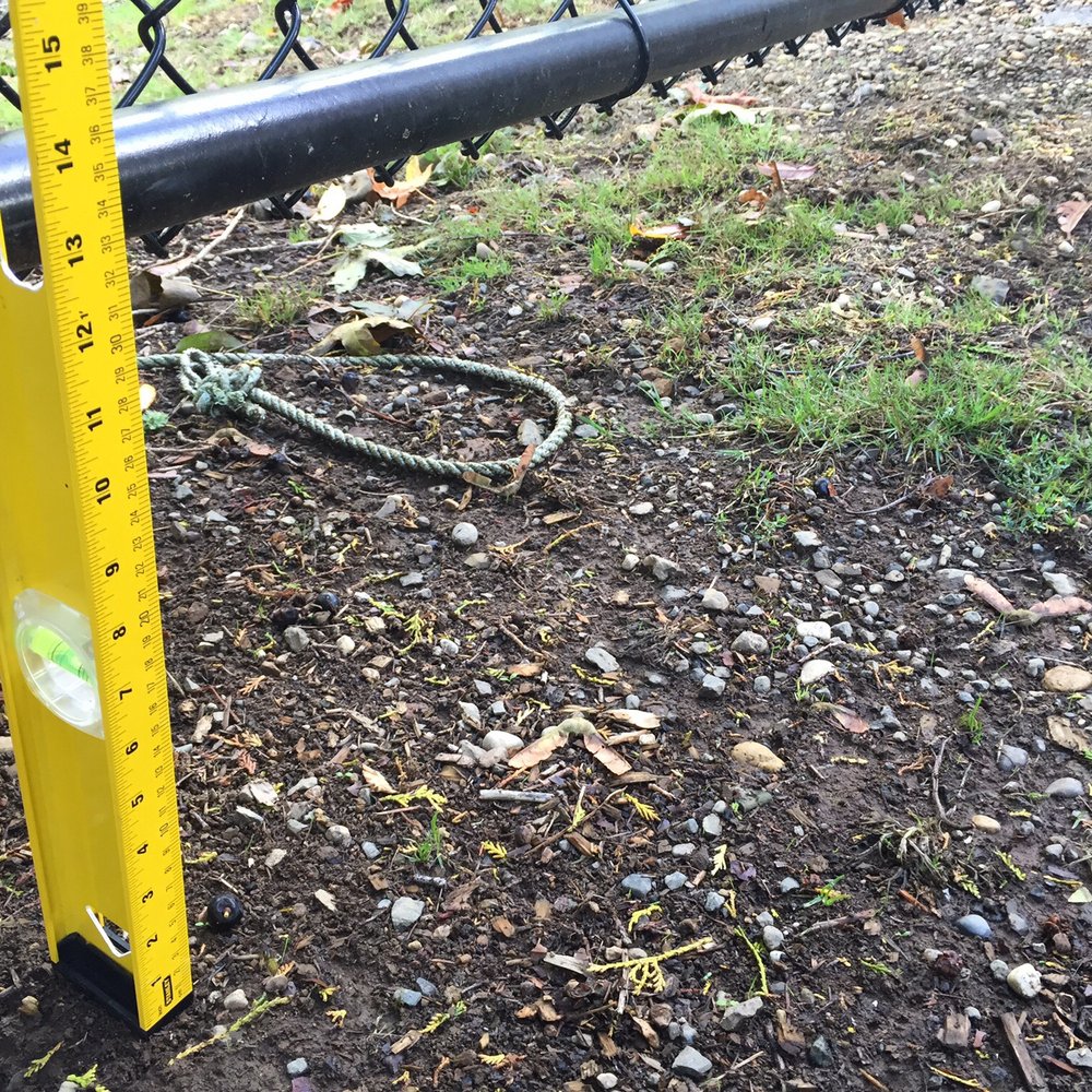 Cliff's Custom Fencing & Decking - 13 inch gap on bottom of gate, Cliff said he would bolt treated lumber to  it to fix , but did not. - Tillamook, Oregon