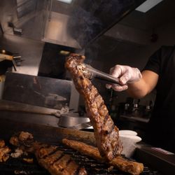 Our Hawaiian-style BBQ short ribs are grilled to order for the perfect balance of smoky char and juicy, tender flavor.