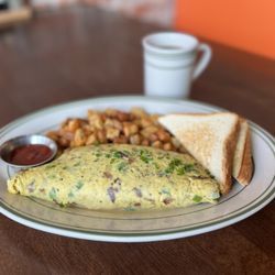Luke's - Build your own omlette, hand-cut home fries, toast, & a fresh cup of Prairie Coffee