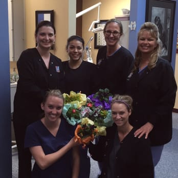 Jessica Brigati, DDS - Mother's Day 2016 team photo. We handed out flowers to our patients that came in for their appointment for the week of Mothers Day! - Pediatric Dentists Near Me - Fort Worth, Texas
