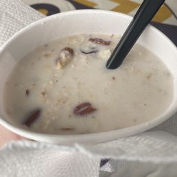 Blueberry oatmeal with a splash of cream Blueberry oatmeal with a splash of cream