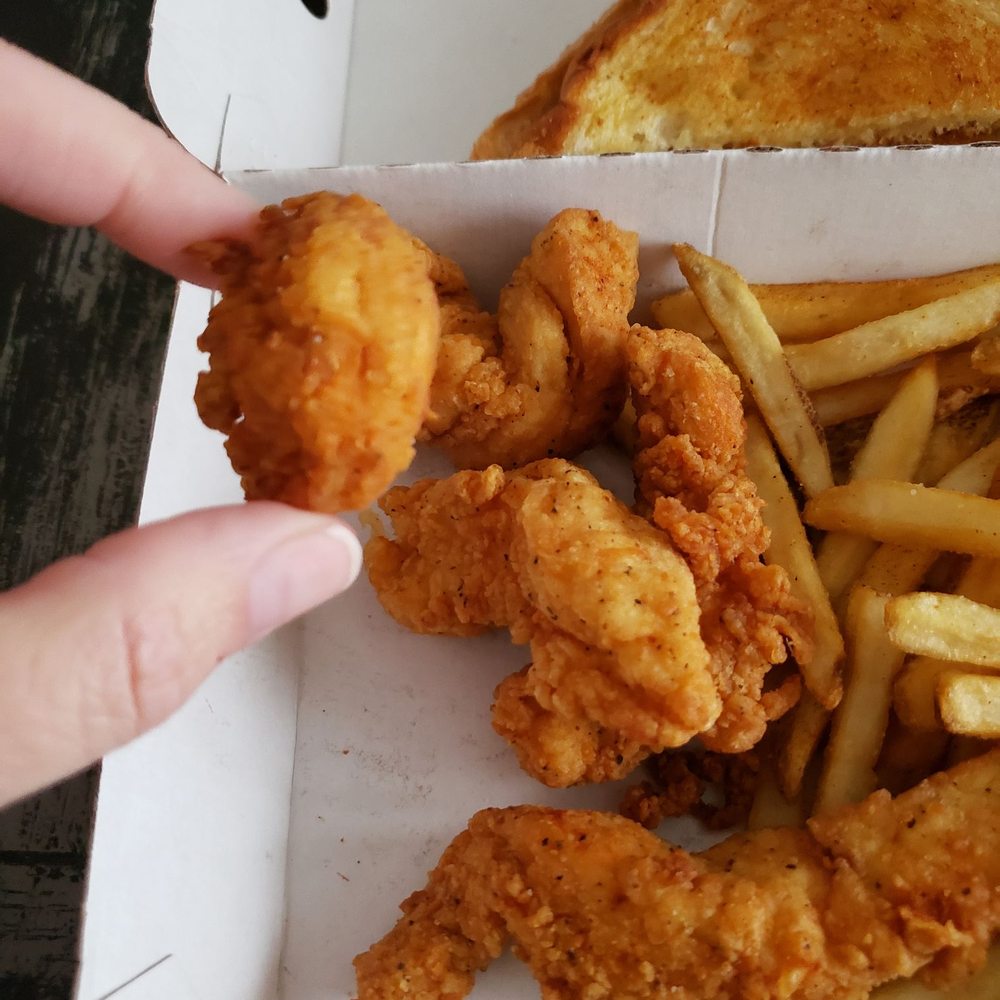 Slim Chickens - Slims meal this nugget they are calling a strip i was suppose to get 5 I got 4 and this nugget - Southern Near Me - Cabot, Arkansas