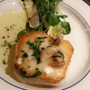 Clark's Oyster Bar - Sea bass with garlic butter - Seafood Near Me - Aspen, Colorado Clark's Oyster Bar - Sea bass with garlic butter - Seafood Near Me - Aspen, Colorado