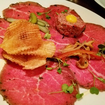 Deuxave - Wagyu beef carpaccio with beef tartare, quail egg, and mushroom escabeche. - New American Near Me - Boston, Massachusetts Deuxave - Wagyu beef carpaccio with beef tartare, quail egg, and mushroom escabeche. - New American Near Me - Boston, Massachusetts