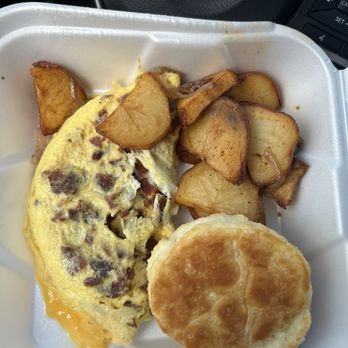 Peach Valley Cafè - Omelette loaded with bacon and cheese with yummy potatoes and a biscuit! - Breakfast & Brunch Near Me - Gainesville, Florida Peach Valley Cafè - Omelette loaded with bacon and cheese with yummy potatoes and a biscuit! - Breakfast & Brunch Near Me - Gainesville, Florida