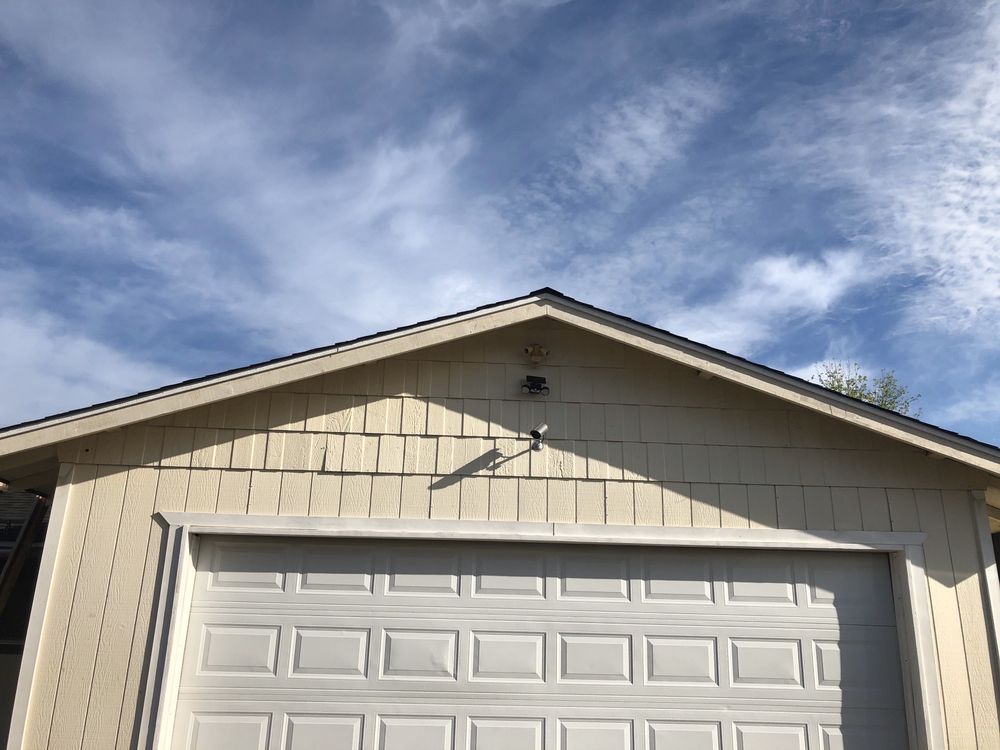 Slide of Tugwell Roofing