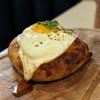 Krasi - Pita with Fried Egg - Mediterranean Near Me - Boston, Massachusetts Krasi - Pita with Fried Egg - Mediterranean Near Me - Boston, Massachusetts