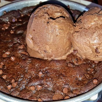 BJ's Restaurant & Brewhouse - Ghirardelli triple chocolate Pizookie. - New American Near Me - Boardman, Ohio BJ's Restaurant & Brewhouse - Ghirardelli triple chocolate Pizookie. - New American Near Me - Boardman, Ohio
