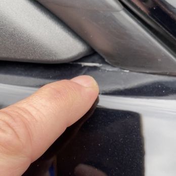 Wyatt Ford - After factory paint tape off with bubbling clear coat from hail damage full repaint of car. - Car Dealers Near Me - Manistee, Michigan