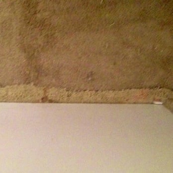Carpet Monkey - Poorly installed unfinished carpet in 95 year old Mom's room. Ragged edge is carpet not replaced in closet. - Carpet Cleaning Near Me