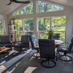 Suncraft  - 14' x 16' floor plan that has both eating and conversation spaces.