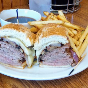 Mountain Oaks Cafe - The Rouge Tri-Tip sandwich. Topped with cheese, sauteed mushrooms and onion on a roll with a large side of Agu dip & fries. - American Near Me - Oakhurst, California Mountain Oaks Cafe - The Rouge Tri-Tip sandwich. Topped with cheese, sauteed mushrooms and onion on a roll with a large side of Agu dip & fries. - American Near Me - Oakhurst, California