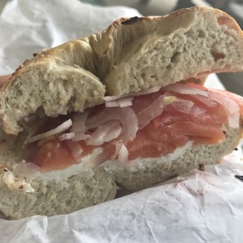 Barrier Island Bagels - Onion bagel with stacked lox, onions, etc.. - Breakfast & Brunch Near Me - Kitty Hawk, North Carolina Barrier Island Bagels - Onion bagel with stacked lox, onions, etc.. - Breakfast & Brunch Near Me - Kitty Hawk, North Carolina