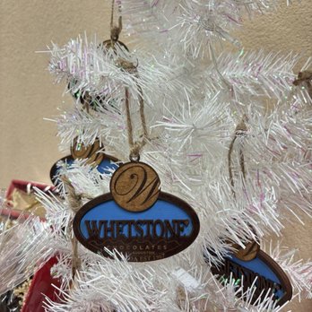 Whetstone Chocolates - A small Christmas tree with Whetstone ornaments. Available to purchase. - Chocolatiers & Shops Near Me - St. Augustine, Florida