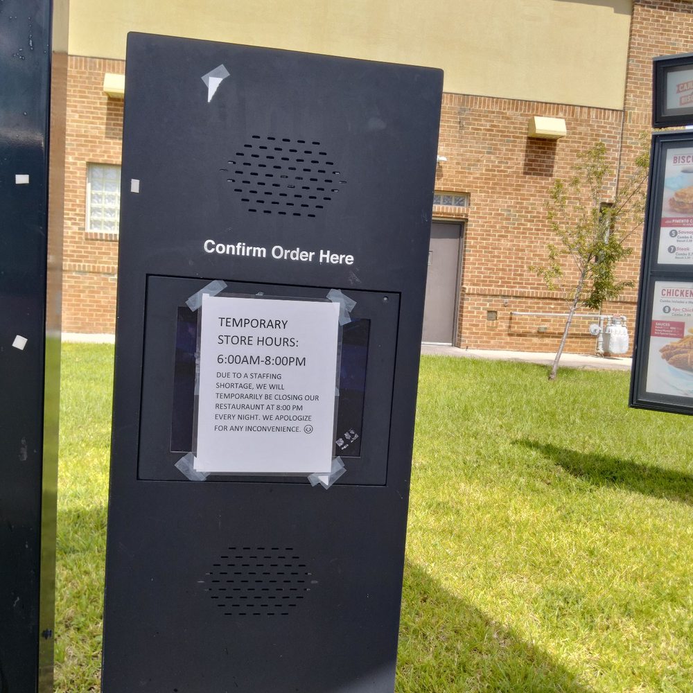  a mailbox with a sign on it