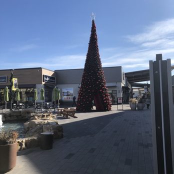 Denver Premium Outlets - The kids I saw really enjoyed being able to play inside the Christmas tree - Outlet Stores Near Me - Thornton, Colorado