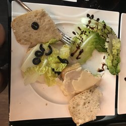 The Bar - Olives & lettuce on only half, and the waiter tried to tell me "they moved when he cut it" just be honest with me omg!!