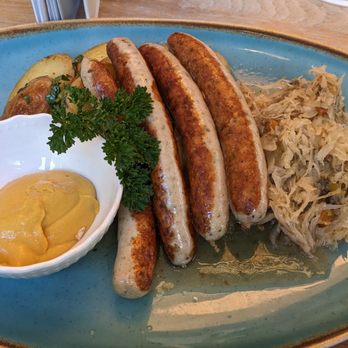 Zwickl - Pork sausage with sauerkraut and fried potatoes - Bavarian Near Me - Munich, BY Zwickl - Pork sausage with sauerkraut and fried potatoes - Bavarian Near Me - Munich, BY