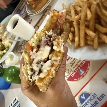 Ryderz Restaurant - Patty melt with grilled and raw onions, plus add tomatoes and lettuce with a side of regular fries - New American Near Me - Oakdale, California Ryderz Restaurant - Patty melt with grilled and raw onions, plus add tomatoes and lettuce with a side of regular fries - New American Near Me - Oakdale, California