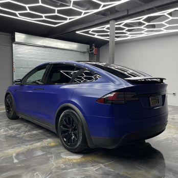 Wraps LA - Tesla model x wrapped in a custom satin laminated blue and full blackout - Vehicle Wraps Near Me - Los Angeles, California Wraps LA - Tesla model x wrapped in a custom satin laminated blue and full blackout - Vehicle Wraps Near Me - Los Angeles, California
