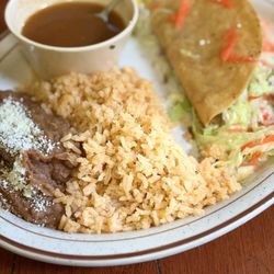 Don Tacorriendo - Refried beans, rice, beef tacos and a bowl of chicken soup.