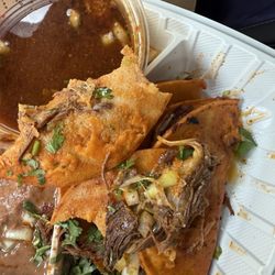 Carnitas El Bajio - Split soggy taco, thick dry meat, no cheese