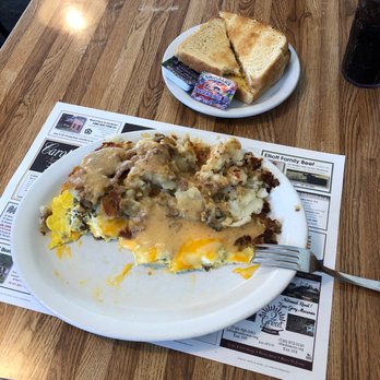 Scott's Diner - Sausage and cheese omelet with sausage gravy over fried potatoes - Breakfast & Brunch Near Me - New Concord, Ohio Scott's Diner - Sausage and cheese omelet with sausage gravy over fried potatoes - Breakfast & Brunch Near Me - New Concord, Ohio