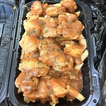 Mr Fries Man - Fries topped with fried chicken bites and shrimp with their sauce. - Fast Food Near Me - Las Vegas, Nevada