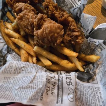 The Pub - TC - Hand cut and breaded fresh chicken strips kids meal with chicken cherry salad sandwich behind it - Irish Pub Near Me - Traverse City, Michigan The Pub - TC - Hand cut and breaded fresh chicken strips kids meal with chicken cherry salad sandwich behind it - Irish Pub Near Me - Traverse City, Michigan