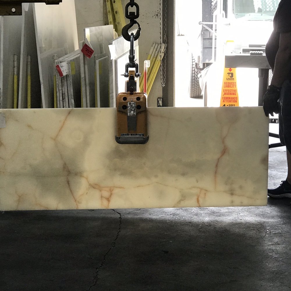 All Natural Stone - Pulling slabs from warehouse stock for selection - Building Supplies Near Me - Burlingame, California All Natural Stone - Pulling slabs from warehouse stock for selection - Building Supplies Near Me - Burlingame, California