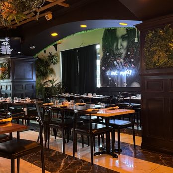 La Buena Vida - Raleigh - a dining area with tables and chairs - Mexican Near Me - Raleigh, North Carolina La Buena Vida - Raleigh - a dining area with tables and chairs - Mexican Near Me - Raleigh, North Carolina