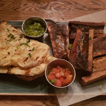 Lechon - Smoked Bone Marrow w/Gaucho Bread - Tapas Bars Near Me - Portland, Oregon Lechon - Smoked Bone Marrow w/Gaucho Bread - Tapas Bars Near Me - Portland, Oregon